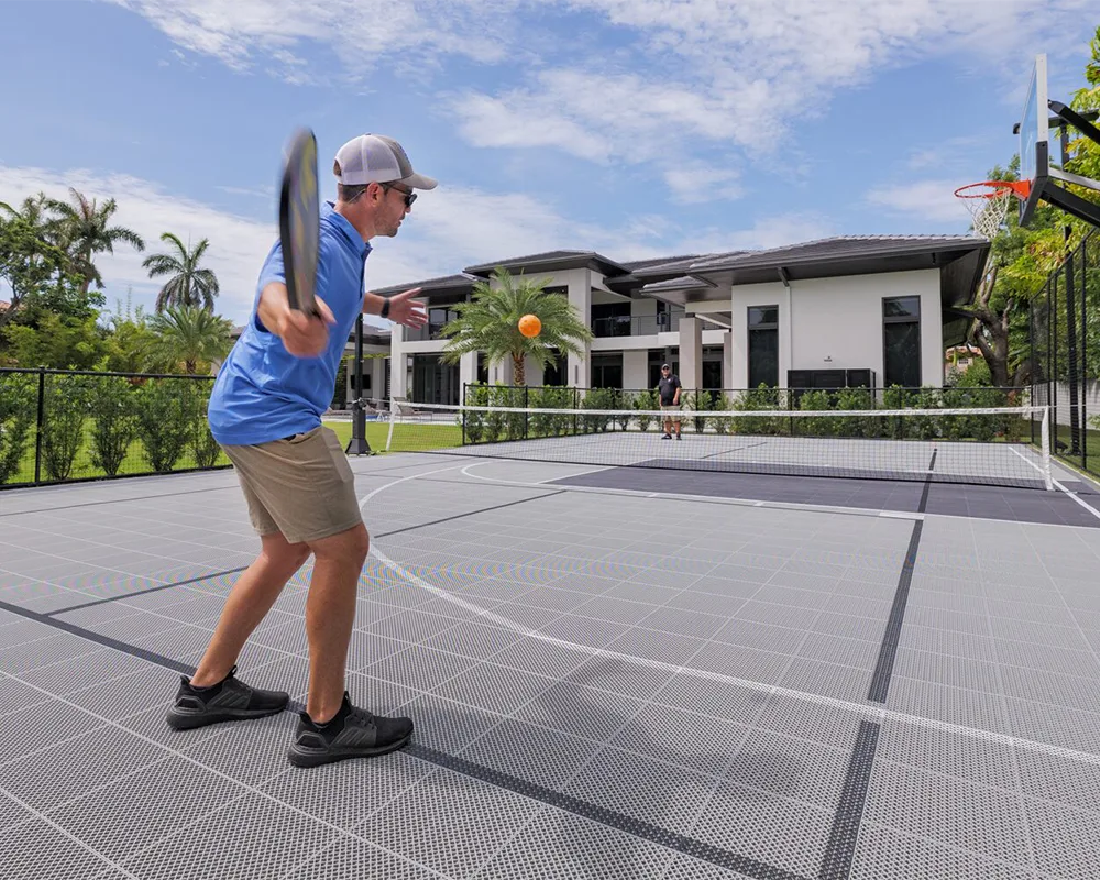 custom-backyard-Pickleball-court-backhand-shot-deshayes-pickleball-courts
